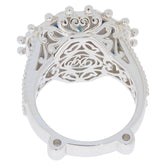 Intricate design of Emerald Blue Topaz Sterling Silver Ring showcasing detailed silverwork.